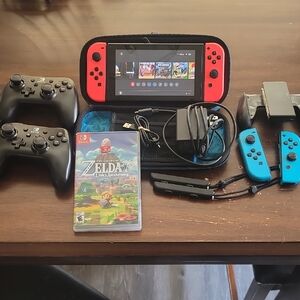 Nintendo Switch Console with Red and Blue Joy-Con Controllers
